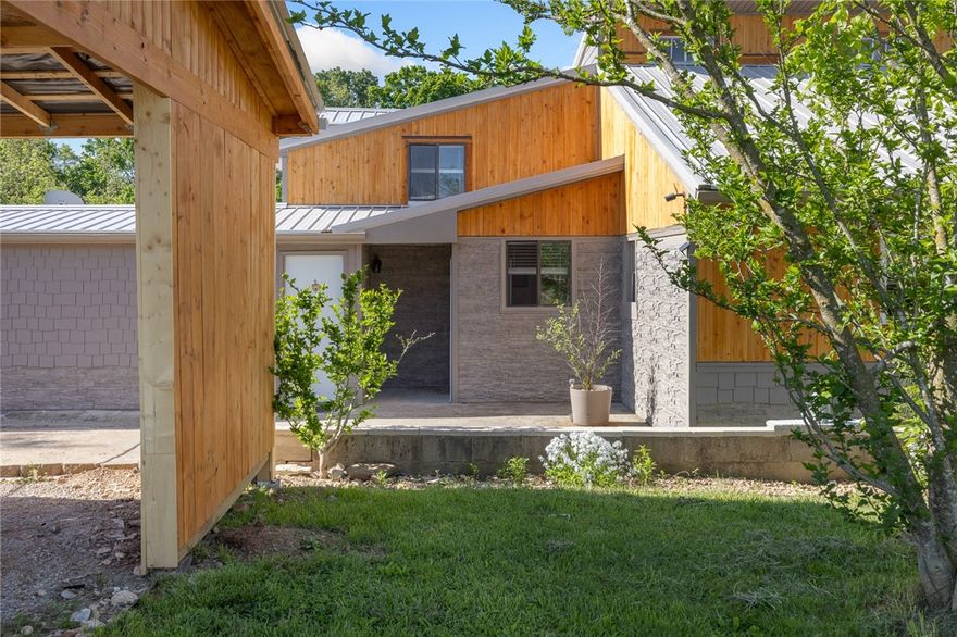 This multi-family home boast a spacious layout with 3 inviting BR & 2 BA in the main house, & an add'l mother-in-law guest house with 2 BR and 1 BA (complete with all furnishings). 4 12K BTU mini-splits. Ideal for accommodating extended family or generating rental income as an AirBNB (rental statements attached). Situated in peaceful rural scenery, this .44 ac lot is just 15 minutes from Harrison and in the Bergman School District. Per seller, there's 2535 sf of living space with an additional 200 sf storm shelter, 100 sf each greenhouse/storage building w/power and a small tool shed for lawn equipment. The 2 car carport w/power has 450 sf of dry storage space above & add'l 4 car for driveway parking. Multiple decks & patios offer extra outdoor living space. The property has its own well (well and pressure tank <3 yrs) as well as rural water available. Fire pit and hot tub with 4 jets. Cedar & Hardie plank siding. Metal roof. Built in 1985, roof has 2 1/8" pine tongue & groove decking! Electric control box <3 yrs
