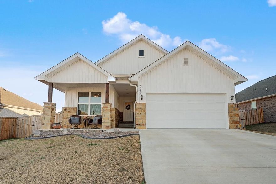 Welcome to 5283 Little Field Ave... an "almost new", 3-bed, 2-bath, split floorplan home centrally located in the Deere Creek subdivision in West Springdale. 10ft ceilings, wood appearance tile flooring & natural light flow throughout the open concept main living area. The spacious Scandinavian style kitchen is at the heart of the home and features Twin Oaks cabinets, stainless appliances, pantry & tons of counterspace. Primary suite has dual vanities, tile shower, garden tub & a walk-in closet that connects directly to the laundry room. Two secondary bedrooms & a full bathroom are off the inviting foyer. Backyard is fully fenced with double gates on each side & a south facing covered patio. Located close to Shaw Family Park, Harber High School, with easy access to I-49 to drive to U of A, JB Hunt or the new Walmart HO within 20 minutes.