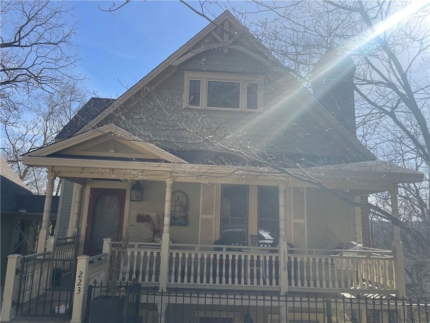 Victorian style home built in 2002 located on Spring St in historic downtown Eureka Springs.  Recent improvements have added approx 1400 sq ft of finished space to the home.  Improvements incl approx 700 sq ft attic conversion to primary bedroom suite w/luxurious master bath & several closets; addition of approx 700 sq ft apartment under garage w/deck; replacing wood picket fence w/iron fencing & adding metal stairs, and walkways;  HVAC added to garage & conversion of above garage storage to finished space w/pull down stairs replaced with fixed stairs;  addition of patio in sideyard; full limestone retaining wall at back of property replaced; powered shades on most windows (Lutron).  Even though the home is newer construction, nods to the past can be found throughout the home with built-ins, period appropriate light fixtures, extra wide baseboards, gingerbread trim.  Covered front porch as well as 2 screen porches.  Very rare 2 car garage with an extra 2 parking spots on driveway.  Approx 7 min walk to downtown ES.