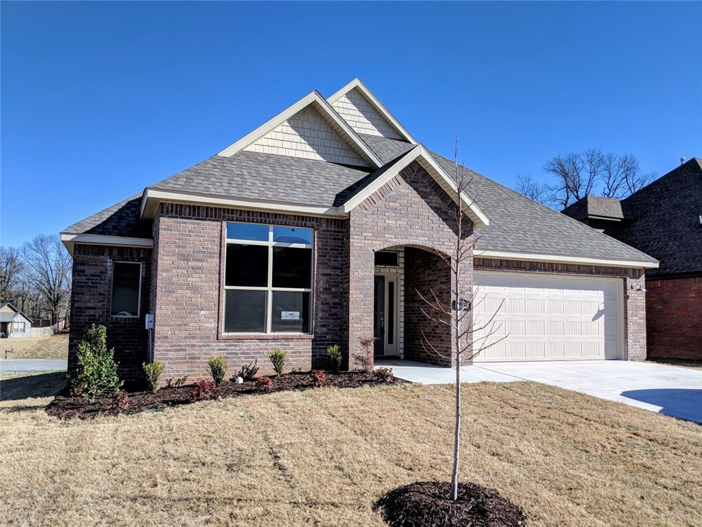 This beautiful 4 bedroom 3 bath home with second level bonus has open living room and kitchen, fire place, hand scraped hardwood floors, ceramic tile, SS appliances, granite countertops, plumbed for central vac., low E-windows, sod & landscaping pkg., all on corner lot. Close to everything; easy access to I-49, shopping, hospitals, entertainment and more.