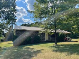 Looking for a home in the country, but still close to town? You have found it!! This 3 bedroom 2 bath home sits on a little over 1 acre right outside the Clarksville City Limits. Enjoy spending time in the LARGE yard, plenty of space for a garden, and also has a concrete slab that could be used as a seating area or even a Hot Tub.