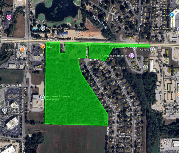 Excellent development opportunity with this 25.64 acre parcel that is zoned C-2 Commercial in Lowell, AR. Water and sewer on site. Topography is sloping from SE to NW. Area has a high traffic count of 26,000 vehicles per day on W Monroe Ave. Access of 1,085 feet of frontage on W Monroe Ave with one current access point and also from Center and Bluff Drive.
Multiple possibilities on this site, which allows many commercial uses as well as multifamily. Potential to subdivide into retail and multifamily sections. Adjacent to JB Hunt headquarters.