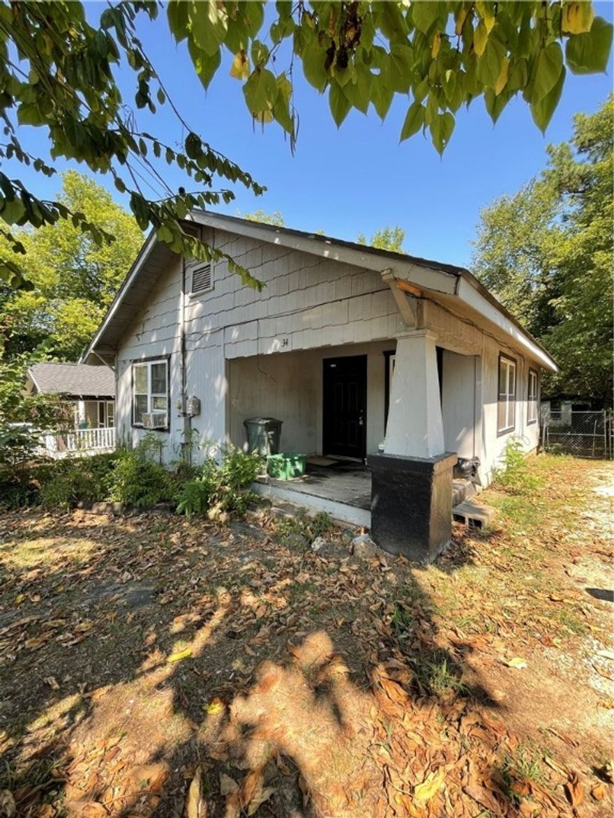 Nice home on large lot in S Fayetteville. Home features 2 bedroom, 1 bathroom, formal dinning room, wood floors throughout, new shower in bathroom, large laundry room, fenced in yard, granite tile countertops in kitchen, and all appliances.
