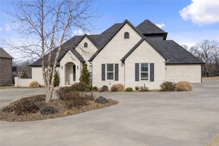 Privately positioned at the end of a quiet cul-de-sac within one of NWA's most beautiful gated communities, this exceptional 4br 4.5 bath estate sits on 2.82 acres. The property offers a heated saltwater pool, expansive backyard with newly installed 6ft tall steel fence & serene natural surroundings. Inside you'll find elegant & modern living spaces, a designer kitchen, & luxurious primary suite complemented by a fitness or flex space & additional bonus room. Just minutes from I-49 & XNA, this residence delivers privacy, sophistication, & convenience in perfect balance.