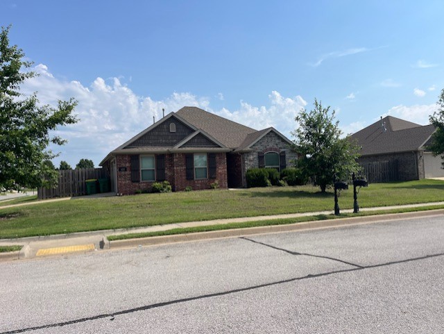 Great all brick 3 bedroom, 2 bath home in convenient location. Gas log fireplace in the living room! Plank wood floors with carpet in bedrooms. Kitchen has stainless appliances with gas stove top. Jacuzzi tub, double sinks and walk-in shower in primary bath. Nice size fenced backyard with covered patio.