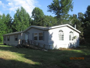A manufactured home, according to Pope County Data, 31x66 and on 5 acres with some fencing.