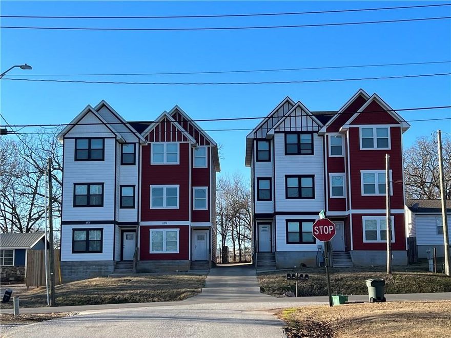 Pre-leasing for August 2026 season! Conveniently located near Baum Stadium!! These townhomes are three bed/3.5 bath and 1800 sqft! Each en suite bedroom has a full sized bathroom and large walk in closet. There is a half bath on the living room/dining room floor for guests. Just 1 block off Razorback rd, walking distance to Baum Stadium. Top of the line appliances. Available August 2nd, 2026 Photos of adjacent townhome since property is occupied.   Agent owned