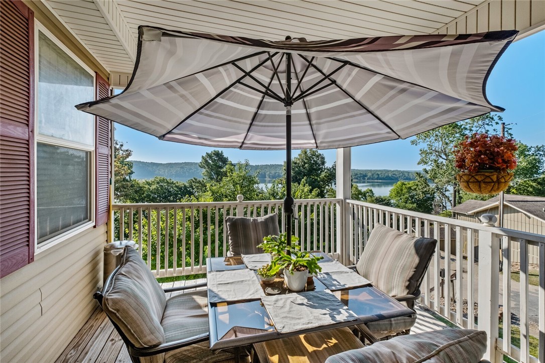 Gorgeous Lake Front Property and Two slips (one is 10x26 and the other 10x30) in the community dock that is just steps away!! This property is a rare find at the end of a quiet street and also close to the community boat launch. There's so much to offer here - the primary suite and another bedroom and bath grace the main level along with living, kitchen and dining spaces. The walkout basement has another sleeping space and full bath along with a second large living area, storage and mechanical room and entrance to the garage. In back is a 30 x 44 shop building that's heated and cooled for all your storage needs. There's also a generator that will convey. Located in a prime spot on Beaver Lake, you can see Horseshoe Bend to the right. You really don't want to miss this amazing property!!
Contents are negotiable with an acceptable offer.