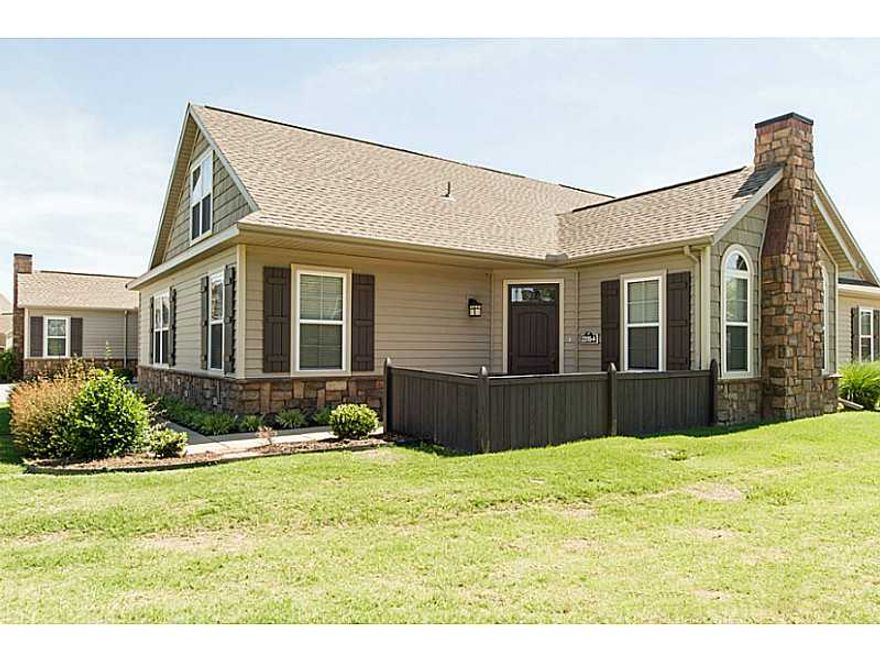 A care-free lifestyle in this luxurious condo. Two-level unit boasts open concept living w/vaulted ceiling and mounted TV over fireplace. Master down and "loft" style suite up, could be a 2nd master. Granite, 2" blinds throughout. Ample storage & garage.,POA fee includes exterior/common maintenance, lawn care/landscaping/irrigation, use of pool & clubhouse. Clubhouse can be reserved for private use and features gathering space w/FP, kitchenette, exercise room, rec rooms w/pool tables, game tables and TVs.