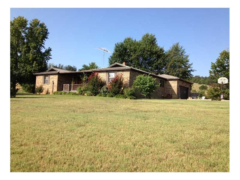 5 Acres, Shop, Barn and 3BR/2BA/2Car, Covered front and back porches, Beautiful views every where you turn around. Clear pastures for horses or cattle.