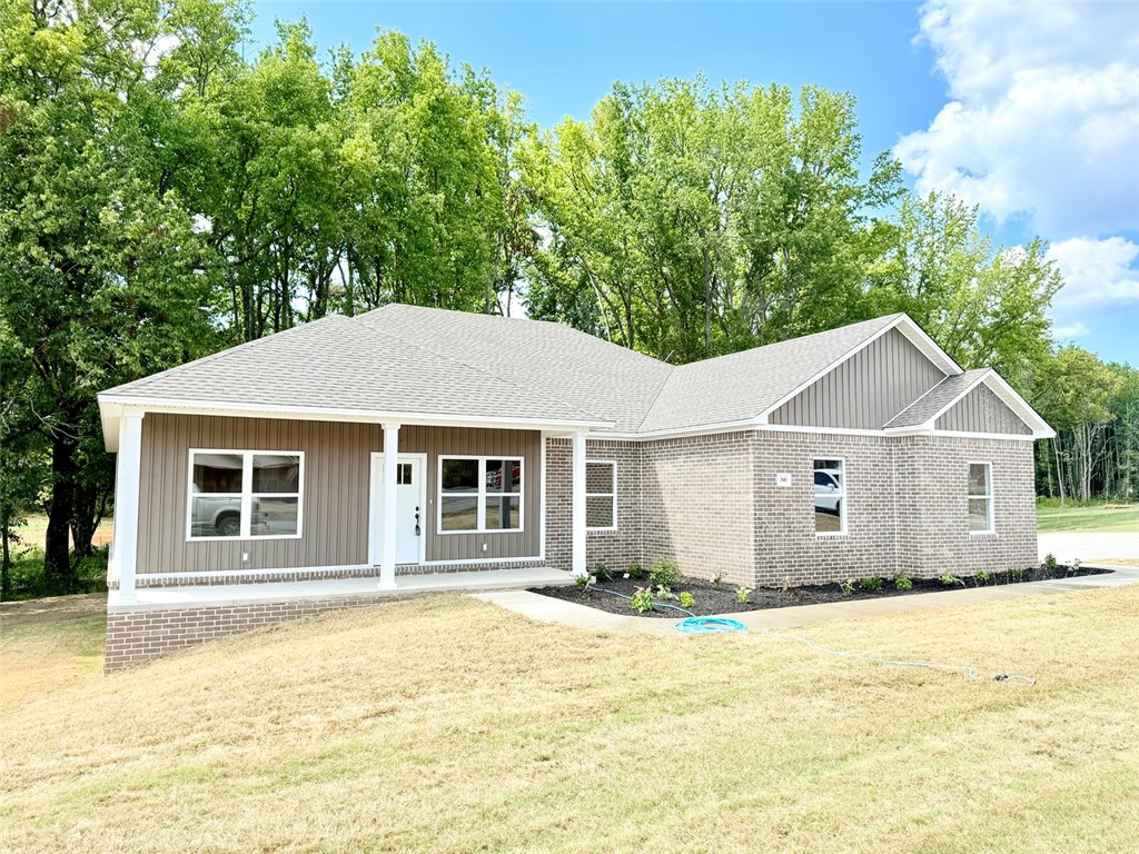 New construction in the desirable Stonegate Subdivision! This 3-bedroom, 2-bath home offers 2,050 sq ft of well-designed living space, complete with an open-concept layout and plenty of natural light. The spacious living room flows seamlessly into the kitchen and dining areaāperfect for entertaining. Just off the dining space, youāll find a bonus room leading to the back porch, where you can relax and enjoy views of the backyard and surrounding trees. The split floor plan offers privacy, with two bedrooms and a full bath on one side, and a generous primary suite on the other, featuring a walk-in closet and a roomy bathroom. A 2-car garage and ample storage throughout complete this beautiful home.