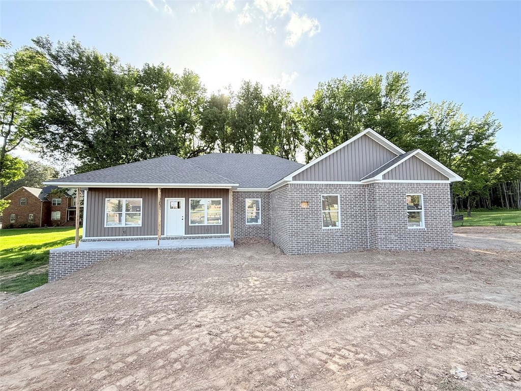 New construction in the desirable Stonegate Subdivision! This 3-bedroom, 2-bath home offers 2,050 sq ft of well-designed living space, complete with an open-concept layout and plenty of natural light. The spacious living room flows seamlessly into the kitchen and dining areaāperfect for entertaining. Just off the dining space, youāll find a bonus room leading to the back porch, where you can relax and enjoy views of the backyard and surrounding trees. The split floor plan offers privacy, with two bedrooms and a full bath on one side, and a generous primary suite on the other, featuring a walk-in closet and a roomy bathroom. A 2-car garage and ample storage throughout complete this beautiful home.