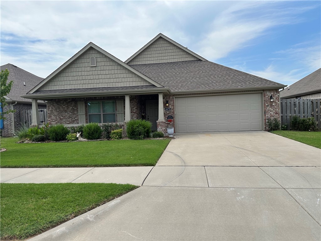 PRICE REDUCED!!Enjoy Living in this Beautiful Landscaped home that is Move in Ready. It has 3 bedrooms, 2 Bath, Full Brick Home that offers a Large Covered Front Porch. This Home is Such an easy home to maintain w/Vinyl Plank Flooring & Tile, Cleanup is a Breeze. The Living Room Has a Vent less Gas Fireplace, Coffered Ceilings, Ceiling Fan & a Doggie door for your Precious Pet!! Great Kitchen w/ Granite Counter Tops, Center Island w/lots of Storage, Walk-in Pantry. The 2 Bdr's & Full Bath are on the entry side of this Home. The Mst Suite Bedroom offers Crown Molding & Ceiling Fan. Large Walk-in Closet & Nice Mst Bath w/Walk-in Fully Tiled Shower. Best Covered Patio View of any home in the Sloanbrooke!! You won't want to come back in after you see the this Back Yard. The View is so Beautiful with the pond and surrounding city lights. You will see the geese & the Boston Mountain as your view!!The Landscaping is Magnificent! This Home is a MUST SEE TODAY!!! It Won't Last Long as Seller has LOWERED the PRICE!