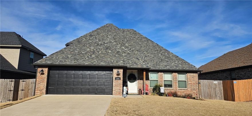 Home sweet home!  4 bedroom 2 1/2 bath home on a quiet street in Siloam Springs.  Primary bedroom is downstairs and 3 bedrooms upstairs.  Open kitchen and living areas perfect for entertaining.  Kitchen has granite countertops and stainless-steel appliances.  New roof in 2025. Privacy fenced backyard. Home was built by Sunrise Residential Construction in 2022.  You don't want to miss this one.