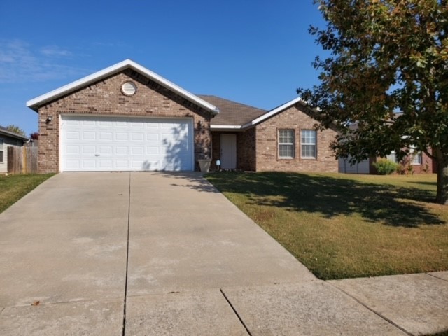 Beautiful 4 bedroom home located in a great subdivision! This home features a spacious fenced yard, a 2 car garage, and a split floor plan for added privacy. Enjoy cozy evenings by the living room fireplace and stay comfortable year-round with ceiling fans throughout. The master suite includes a generous walk-in closet. A perfect blend of comfort and convenience! Tenant to provide refrigerator, washer, dryer and lawn maintenance. We process applications as we receive and once an application is approved, we reach out for deposit. Deposit secures the unit not the application. Please be aware of scams. Our application process is to be paid online through a secure portal, and we do not accept cash, CashApp, Venmo, and/or PayPal. No showings until after June 11