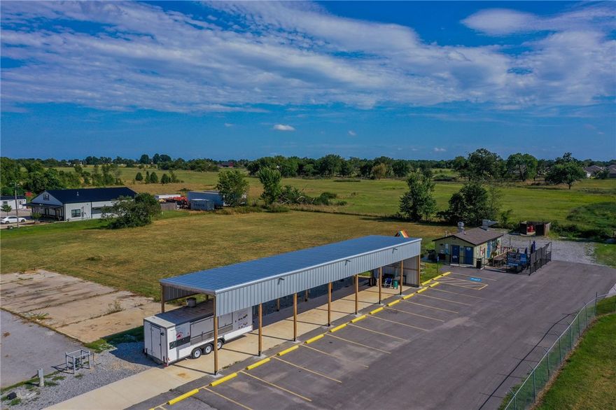 Prime Commercial Land with Food Truck Parking. Unlock the potential of your business with this commercial property suited for a service establishment. This property features a 528 sqft establishment with two restrooms attached. It's perfectly positioned in a high-traffic area with excellent visibility, this versatile space offers ample parking and designated sports for food trucks, making it an ideal hub for culinary entrepreneurs and mobile vendors.