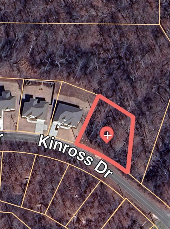 Nearly half an acre of land available on Kinross Drive, already perc tested and approved for a 3-bedroom home. Ideally located just minutes from Lake Lomond, the Razorback Greenway, the recreation center, shopping, dining, and entertainment. Highlands Golf Course is only a few miles away, and the Highland exit is just 2 miles from the property. A perfect spot to build your dream home in a convenient and scenic location!