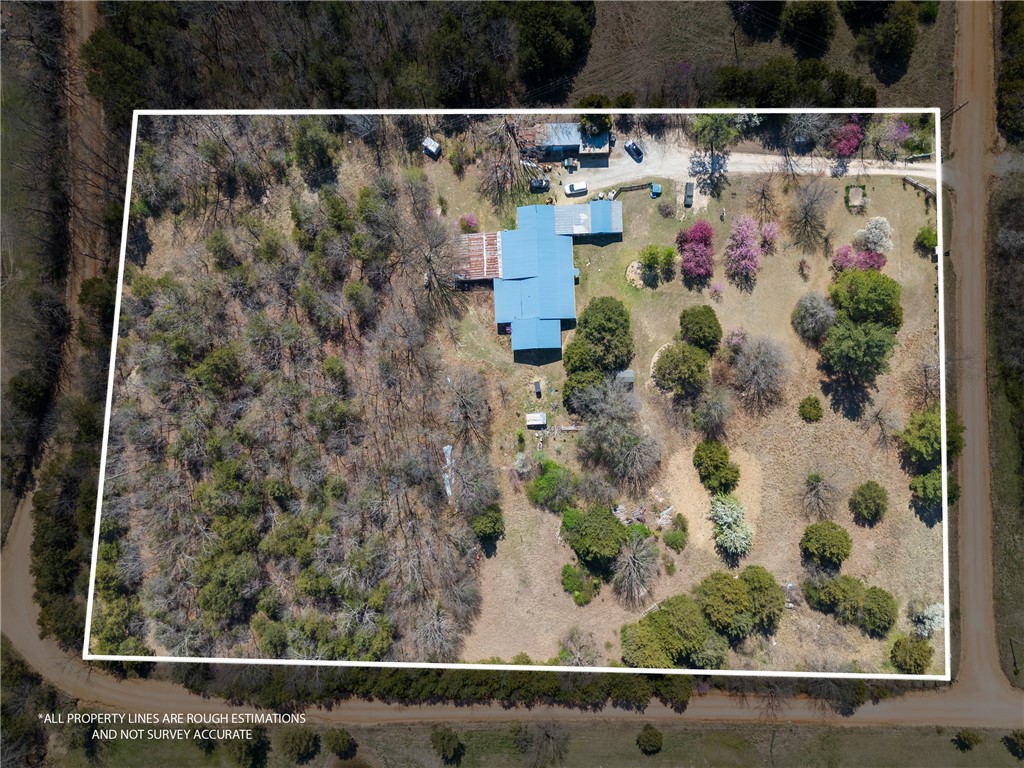 Enjoy the beauty of country living with this charming home nestled on +/- 5.13 acres of scenic land. Located just 10 minutes north of Berryville, this property offers plenty of space and potential. The 3-bedroom, 1-bathroom home features a generous layout, with some unfinished areas, making it a great opportunity for a handyman or investor. Conventional financing is not an option, cash or an in-house bank loan will be required. Don't miss this chance to create your dream country retreat!