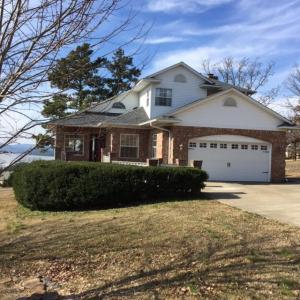 Million dollar view! Beautiful 4BR, 3.5BA home in a private, gated community. Enjoy breathtaking views of Lake Dardanelle from almost every room or step onto the spacious deck and breathe in fresh air. Formal DR and centrally located kitchen w/an abundance of cabinets - opens to den w/cozy FP. Office/5th BR on main level. Lavish master bath with a whirlpool and walk-in shower. Finished walk-out