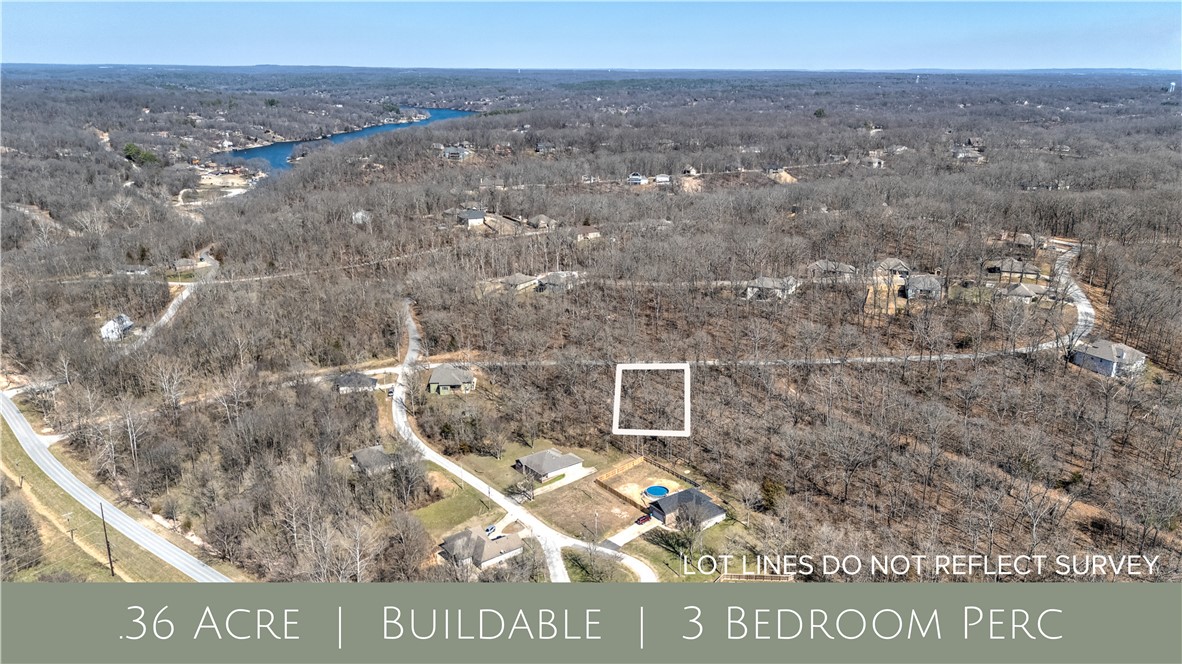 Discover the perfect canvas for your dream home on this .36-acre buildable lot in Bella Vista, Arkansas. Conveniently located just a few lots away from the Tunnel Vision Trail and near to Huntley Gravity Park, this lot offers easy access to outdoor adventures. Lake Windsor is also nearby, providing picturesque water views and recreational activities.
This lot has already undergone a successful perc test for a 3-bedroom home, making the building process even smoother. Situated within the Bentonville school district, it offers the ideal mix of peace and convenience. You'll be close to everything Bella Vista and Bentonville have to offer.
Adding to its appeal, the new Blue Crane development led by the Walton family will transform Bella Vista into a premier outdoor recreation destination with 2,700 acres dedicated to community-enhancing projects, perfect for nature lovers and active lifestyles.
Don't miss this opportunity to create your custom sanctuary. Secure your slice of paradise today!