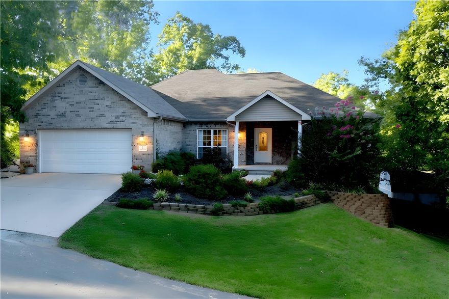 Private wooded retreat with finished walk-out basement and outdoor living spaces in the heart of Bella Vista. Welcome to a beautifully updated home that blends comfort, craftsmanship and outdoor living on nearly half an acre. Inside you'll find over 2600 sq ft of flexible space including a bright main-level living area with crown molding & hardwood floors, a chef's kitchen with granite counters & custom cabinetry and a spacious primary suite with walk-in closet and spa-like bath. The walk-out lower level offers a media room, game space and extra storage - perfect for entertaining, hobbies or a private guest retreat. Step outside to enjoy your own private oasis: a large deck for morning coffee, a fire pit for evening gatherings and a fenced yard with mature trees that creates a quiet, park-like setting. Other highlights: Thoughtful upgrades throughout, 2 car garage plus a shed for tools and toys, convenient access to trails, lakes & golf courses that make Bella Vista one of NW Arkansas' most desirable communities.