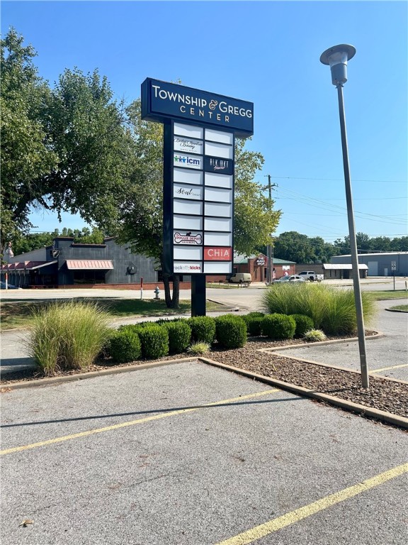 Office/Retail End Cap Space For Lease - Prime Midtown Fayetteville Location. This end cap suite offers excellent visibility with frontage on both Township St & Gregg Ave. The space features a large, open showroom, a stock room or small private office, and one restroom. Tenants will enjoy access to 100+ parking spaces and a tall, shared monument sign for added exposure. Located in the heart of Midtown Fayetteville, this space is perfect for small businesses seeking premium exposure and convenient access in a bustling area. Tenant pays utilities.
