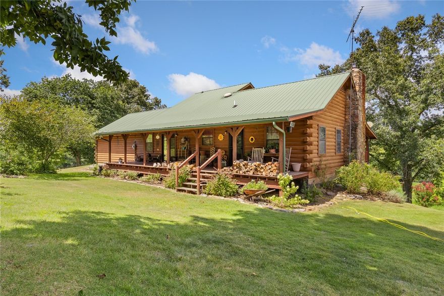 Nestled on 160 secluded acres near the Buffalo National River, this stunning log home offers the perfect blend of rustic charm and modern comfort. With over 3,400 sq ft of living space, the home features 4 bedrooms, 3.5 bathrooms, and a flexible bonus room—ideal for a home office, play room, or hobby space. You’ll love the cathedral ceilings, wood stove insert, and views from the expansive decks. The property includes a large 1,440 sq ft barn, a spring-fed pond, a mix of open pasture and wooded acreage, and beautiful landscaping. Whether you’re looking to homestead, hunt, explore, or simply get away from it all, this private retreat checks every​​‌​​​​‌​‌​​​‌‌​​​‌‌‌​​‌​​‌‌​​​​ box.