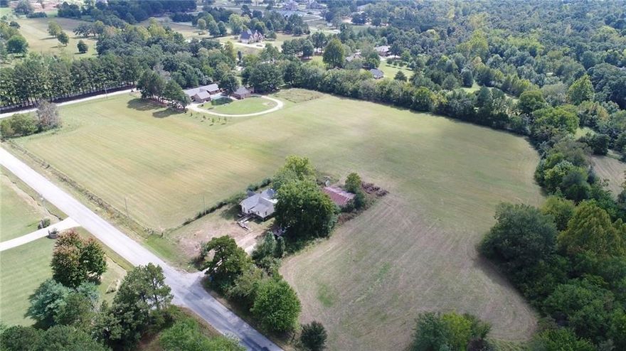 17.0 Acres of beautiful mixed pasture land and trees available with multiple possibilities to build your dream home, small farm or hold for investment in this growing and highly desirable area of 
East Fayetteville. Surrounded by large estate homes. Pond, 2 seasonal creeks and well are located on property. Frontage road on Bridgewater with another access from Oakland-Zion. COUntry feel but just minutes away from NWA's finest schools, shopping and restaurants. 
OWNER WILL SUBDIVIDE INTO 3 PARCELS!