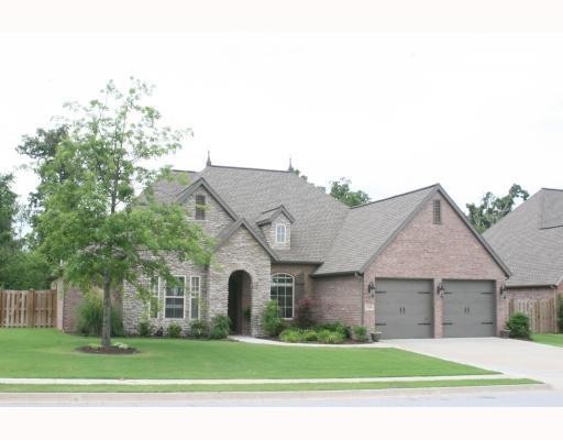 Gorgeous 3-bedroom, 2 1/2-bath brick home in the desirable Lexington Subdivision. Conveniently located with access to nearby trails, within walking distance to Fairview Elementary, and just minutes from Pinnacle Hills Promenade. The split floor plan includes an additional room with custom built-in cabinets, perfect for a home office. Enjoy the community pool that this welcoming subdivision offers. Thoughtful architectural design and a spacious backyard provide both privacy and the perfect setting for entertaining.
