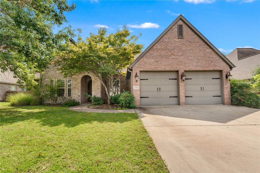 Gorgeous 3-bedroom, 2 1/2-bath brick home in the desirable Lexington Subdivision. Conveniently located with access to nearby trails, within walking distance to Fairview Elementary, and just minutes from Pinnacle Hills Promenade. The split floor plan includes an additional room with custom built-in cabinets, perfect for a home office. Enjoy the community pool that this welcoming subdivision offers. Thoughtful architectural design and a spacious backyard provide both privacy and the perfect setting for entertaining.