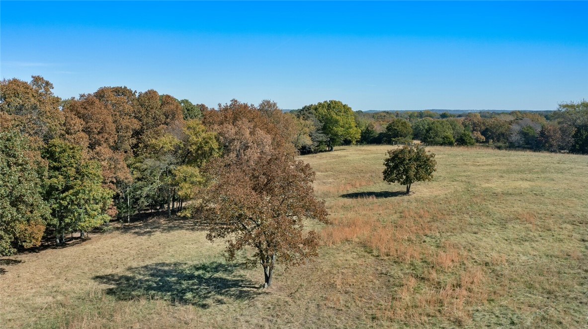 Enjoy country living but only minutes to Fayetteville. This beautiful property already has cleared areas to build. This tract is partially wooded and open and is only 5 minutes to Lake Sequoyah where you can enjoy hiking trails or kayaking. See also MLS#1269759