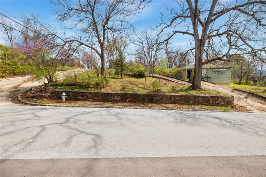 Located in the heart of Fayetteville, this prime, cleared lot offers exceptional location and walkability to the Fayetteville Square, Walton Arts Center, Fayetteville Public Library, along with shopping, dining, and nearby trails. Previously improved and now ready for construction, this property presents a rare opportunity in one of the city’s most sought-after areas. Zoned Downtown General, it offers outstanding flexibility for a custom primary residence or potential multi-family or mixed-use development (buyer to verify permitted uses and density). Whether you’re looking to build your dream home in a walkable urban setting or capitalize on development potential, this lot delivers location, versatility, and long-term value. Opportunities like this in downtown Fayetteville are limited—don’t miss your chance to build or invest in the center of it all. Schedule your showing today!