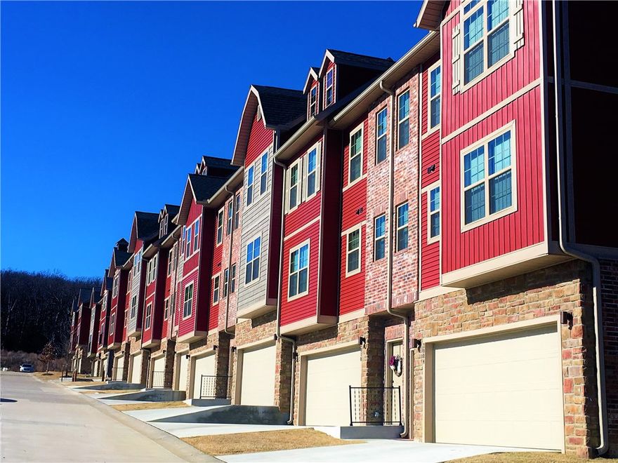 Great townhouse off I49! Townhouse has 2 beds, 2.5 baths, 2 car garage with open concept layout. Kitchen and living area are complete with pantry, island, and all appliances. Walk out back patio from garage. Great location that is just minutes away from University of Arkansas, shopping and easy access to I-49. Pictures are of like unit - all townhomes are the same layout and finishes. Showings are by appointment only. Available to move in Sept. 1.