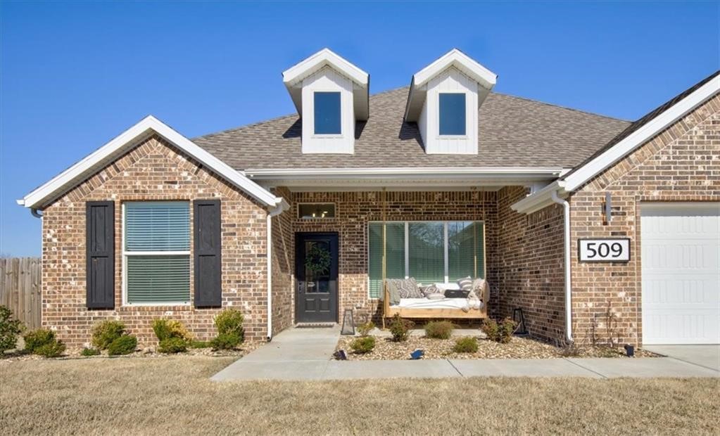 Welcome to your dream home in the highly desirable Goose Creek Village subdivision, a charming neighborhood just minutes from the U of A and I-49. This brick 4-bedroom home is perfect for both everyday living and entertaining. Enjoy a formal dining room for special occasions or use it as flexible extra space. The open kitchen features an upgraded stainless gas range, quartz countertops, a gas log fireplace with a wood mantle, and a double island with abundant storage. Relax on the spacious front porch or gather in the 0.38 acres backyard with a covered patio. Conveniently located near Fayetteville and Farmington, with easy access to shopping, parks, and schools. Come see this beautiful move-in ready home for yourself!