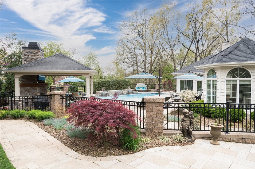 Come see this Showstopper in the highly sought after subdivision, The Acres. This home has been continuously updated and remodeled for since 2015. Exterior features include extensive landscaping, Private In Ground Gunite Pool, Built in Outdoor living featuring Woodburn Fireplace under the custom Gazebo. Interior features include New Handscraped Hardwood flooring, New Paint, New Lighting, remodeled Kitchen. Other custom features include: New Iron front doors, Custom Paver driveway, walkway and pool decking, Perlich Wine Fridges, Custom Garage storage with Liquid Granite flooring, Anderson windows throughout, Irrigation system. Master bedroom Downstairs, 4th bedroom upstairs has an En-Suite bath and 2nd and 3rd bedrooms share a Jack and Jill bath.