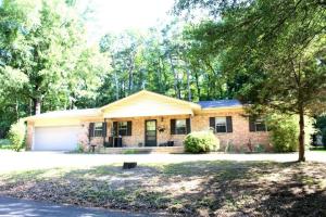More space for the money! Set in a lovely neighborhood with lots of mature trees, you'll find this wonderful 1400 sf home with a 2 car garage, large yard, 3 bedrooms, 2 full baths and tons of updates! There is a spacious living room, formal dining area, remodeled kitchen, and ample storage. Lovely light fixtures, wood flooring, and a modern color scheme highlight this beautifuly updated home! There is even a storage building in the fenced yard! The roof is brand new, the heat and air is new and the sellers will even offer a home warranty with an acceptable offer to make buying this home worry free!