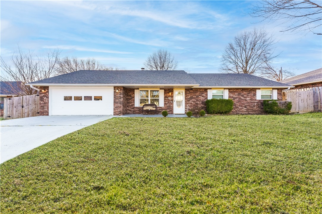 This home near downtown Bentonville is your chance to own a nice place of your own in Arkansas’s most appealing city. A very short drive or bike ride north to the Square, northwest to the new Walmart Home Office, and in any direction for shopping, dining, and more, this updated home has a dream location. The living room has a corner wood-burning fireplace surrounded by a brick face. In the kitchen and dining area, there is plenty of space for a full table, lots of storage and counter space, plus bar seating. Both bathrooms have been beautifully upgraded with sleek walk-in tile showers, new toilets, and new high quality countertops. There is also a fenced backyard with a seating area. Property is currently a BNB and has a proven track record of cash flow.