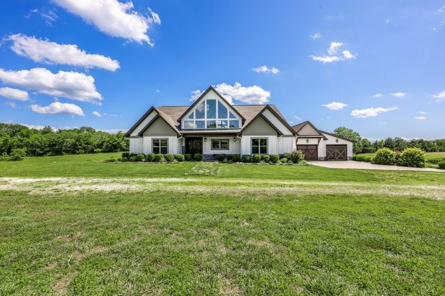 AMAZING RARE OPPORTUNITY! 2 houses+private inground saltwater pool+20x50 Metal Shop+ponds+39.4 PRIVATE Acres within 20 Minutes to all NWA has to offer! This Diamond in the Rough features a contemporary 3 Bdrm/2.5 Bath home built in 2018 & a 1 bdrm/1 bath cabin surrounded by nature! The main house is loaded with amenities such as the popular split bdrm plan, kitchen/living area have stunning cathedral ceilings wrapped in natural pine planks & wood beams, chefs kitchen includes a farm house sink, granite counters, top of the line SS appliance & oversized island all open to the dining & living area with native stone wood burning FP insert, picturesque windows overlooking NEW inground saltwater pool & 10 FLAT acres. Massive Primary Suite w/office, bath hosting separate vanities, walk-in custom tile shower, jetted tub & WIC. The Cabin has been recently updated: New Metal Roof, deck, appliances, countertops, paint & flooring. Enjoy the natural spring, ponds, abundance of wildlife & MORE!