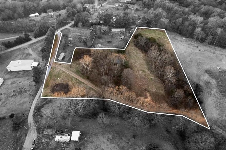Endless Possibilities Await! Build your dream home—or two—on this versatile piece of land! Imagine a stunning hillside retreat above and a second home or guest cottage nestled in the lower cleared area where a charming old barn once stood. The groundwork is already done and ready for your vision! Ideally located just minutes from Springdale, with quick access to Beaver Lake—only 5–10 minutes to the Natural Walk boat ramp and 15–20 minutes to War Eagle Marina & 10 minutes to grocery store and restaurants. Whether you're looking for a private escape, family compound, or investment opportunity, this property offers it all!