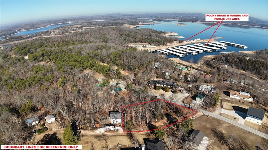 Great opportunity to build your dream lake home just minutes from the water! This .53-acre corner lot at Park St and Canary Rd is located less than one mile from Rocky Branch Marina on Beaver Lake, offering a quick 2-minute drive to water access for boating, fishing, and lake recreation. This property offers a great building site with covenants in place to help maintain the quality of the area. Public water and electricity are available at the street, making it ready for your future lake getaway or full-time residence. Enjoy the convenience of nearby lake access while still having plenty of space to create your ideal retreat. Don’t miss this chance to own a great lot in a highly desirable lake area! Recent survey and covenants are attached to listing.