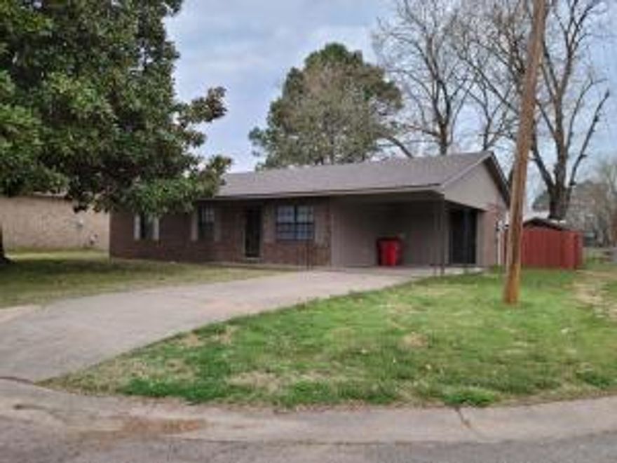 Newly remodeled!!!  3 bedroom 1.5 bath brick ranch style home, close to middle and high school. This home sits on a corner lot with a fenced backyard and a carport. Roof is new!