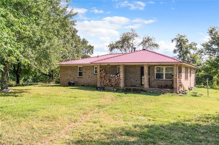 Charming well maintained farm house with new metal roof, central HVAC, nice wood stove, surrounded by national forest, 5 ponds, 3 wells, beautiful view. approximately 100 acres woods rest is pasture. Excellent cattle farm & a hunters dream too! Wildlife abounds with wild hogs, deer, black bear, turkey & small game. Also another home site with well, electric, septic & its own access. 40x60 barn & 30x34 detached garage.