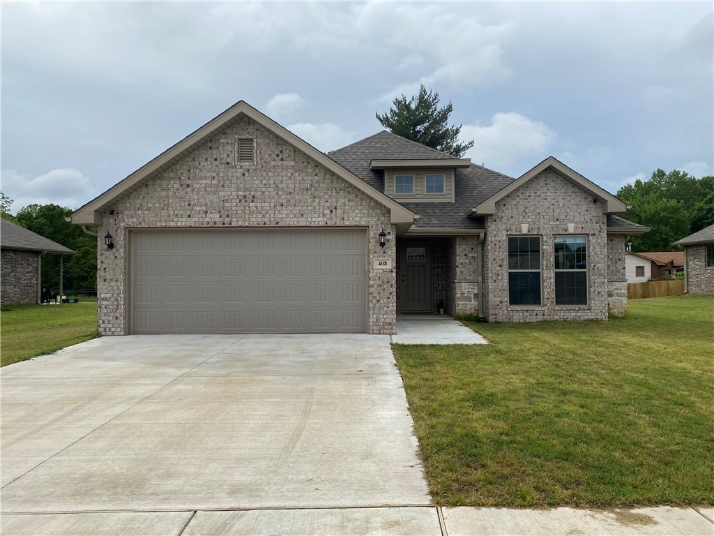 Beautiful all brick home in growing Pea Ridge! This immaculate 3 bedroom 2 bath home is less than a year old and boasts 10 foot ceilings throughout the open concept living and kitchen areas. Large master with a great en-suite with a big walk in closet. The home has updated laminate flooring, custom painted cabinets and dining room light fixture. Entertain from your large island looking into the open living area with a corner fireplace ready for get togethers. This home is well maintained, sparkling clean and ready to move in! Solar panels installed and come with home.