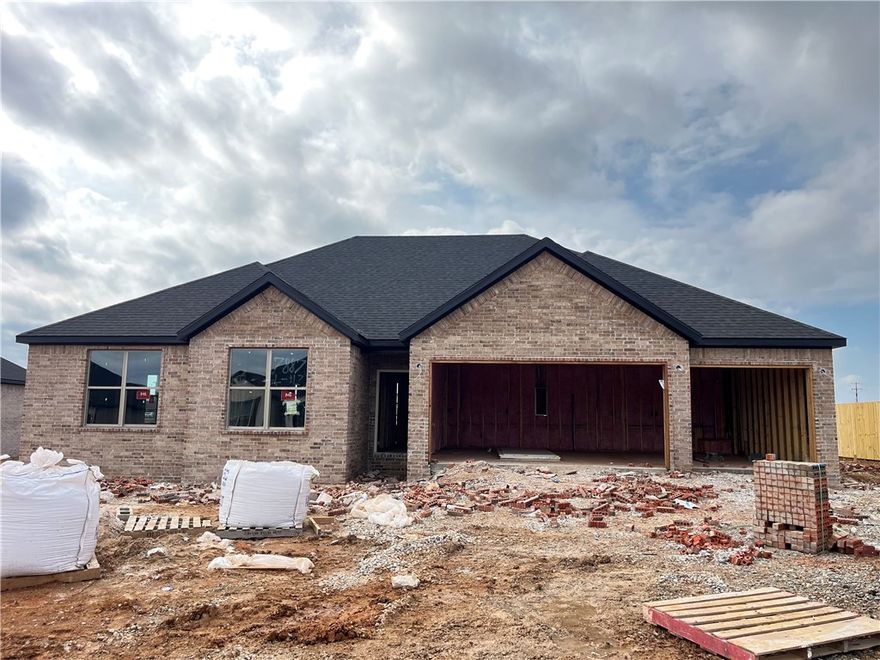 Experience the Lucy plan at Spring Creek Farms. This modern community will feature a community pool, playground and walking trails. The Lucy Plan offers refined single-level living with a thoughtfully designed 4-bedroom, 2.5-bath layout that blends comfort and sophistication. The open-concept design is enhanced by soaring vaulted ceilings accented with beams, and gas log fireplace. The kitchen is beautifully appointed with custom soft-close cabinetry extending to the ceiling, a gas range, fully vented hood, and built-in microwave—perfectly balancing style and functionality. The primary suite is a serene private retreat, featuring a a tray ceiling in the bedroom and a luxurious walk-in shower and soaker tub for a true spa-like escape. A 3-car garage and a large covered patio with gas and ethernet hookups complete this thoughtfully crafted luxury design.