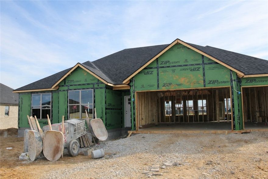 Experience the Lucy plan at Spring Creek Farms. This modern community will feature a community pool, playground and walking trails. The Lucy Plan offers refined single-level living with a thoughtfully designed 4-bedroom, 2.5-bath layout that blends comfort and sophistication. The open-concept design is enhanced by soaring vaulted ceilings accented with beams, and gas log fireplace. The kitchen is beautifully appointed with custom soft-close cabinetry extending to the ceiling, a gas range, fully vented hood, and built-in microwave—perfectly balancing style and functionality. The primary suite is a serene private retreat, featuring a a tray ceiling in the bedroom and a luxurious walk-in shower and soaker tub for a true spa-like escape. A 3-car garage and a large covered patio with gas and ethernet hookups complete this thoughtfully crafted luxury design.