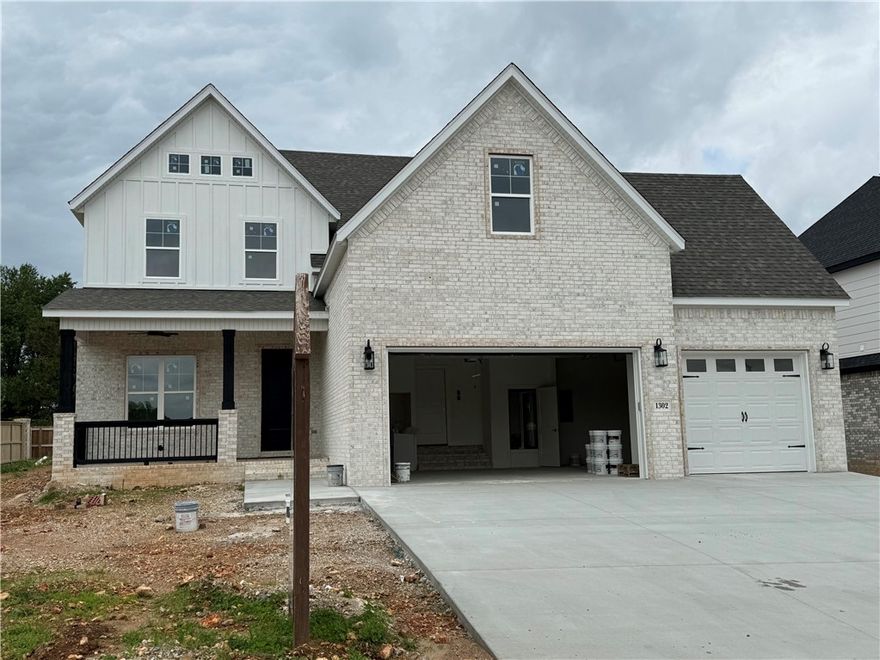 New Construction in SW Bentonville! The Weaver Plan. Home features 5 bedrooms, 3.5 baths, study, and bonus room. Primary Bedroom on lower level and 4 bedrooms plus bonus upstairs. Walking distance to Central Park Elementary School. Quality modern finishes. Upgraded amenities include 10' ceilings on 1st floor, 2-50 gallon water heaters w/ circulation pump, 6' soaker tub, cedar beams, ceiling high kitchen cabinets, covered outdoor patio with fireplace, central vac, & more. Great open plan - spacious kitchen with center island, double ovens, hooded vent, & custom cabinets. Living room and patio wired for sound. Welcome home to Clarendon Heights!