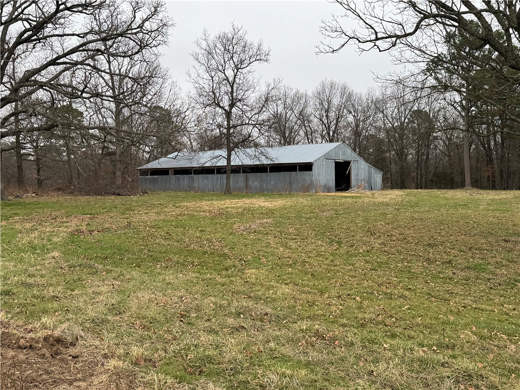 20 Acres plus a barn and pond! Part of 110 Acres that can be split in multiple ways for bigger tracts. Lots of county road frontage. Property on both sides of the road. Beautiful home building sites. Rural water is available. Septic needed. Beautiful views. Some pasture, some woods. 15 minutes from Harp's parking lot in Lincoln. Subject to split approvals. Soil test has been done. Agent owned. See also MLS 1322634-1322638
