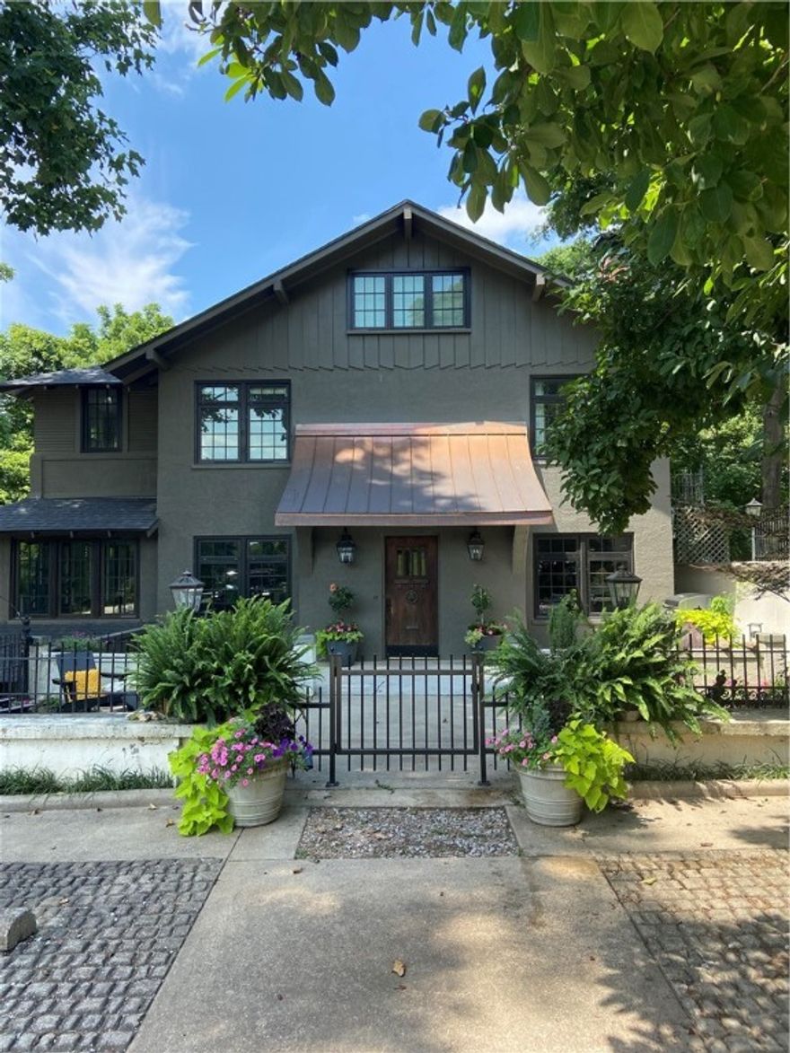 Beautifully restored home in the heart of Fayetteville’s Historic District. Heard of the book “Once Upon Dickson?" You’ll find this property in it. Main part of the home includes 5 BRs/4.5 Baths, restored original hardwood floors & doors throughout, custom mahogany casement windows, handmade natural stone fireplace, Carrara marble bathroom floors, quartz countertops (kitchen island), Sub-Zero fridge & freezer, Brookhaven & Wood Made cabinetry, Kitchen-Aid 6 burner gas range & double ovens, restored original cast iron master tub, fire escape, copper water pipes (anti-microbial), spray foam & denim insulation. Ground level basement includes 1 bedroom + full bath, large living area loaded w/ west facing windows, new kitchen cabinets and cozy sitting area overlooking some of the oldest trees in town. Heated & cooled kitchenette on the ground level & it's perfect for outdoor entertaining! There is a year-round creek, fully fence garden, pavilion, gazebo, patios, tree swings, two-story play structure, shop & shed