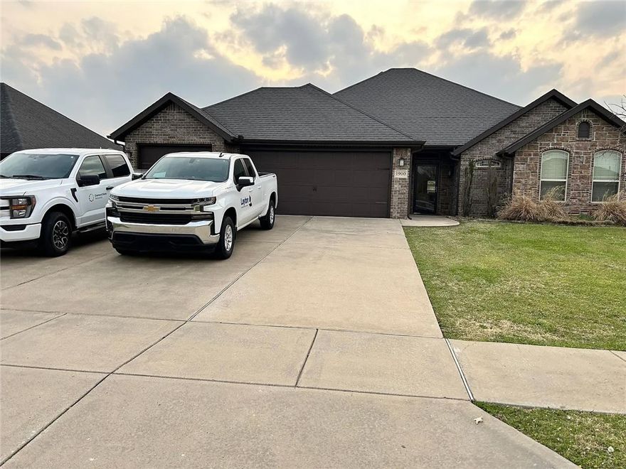 It has a lot of appealing features like the split floor plan, spacious living area, and that big backyard. Being in the Bentonville school district and so close to everything is definitely a plus. The high ceilings, wood floors, granite countertops, kitchen island, and gas range add a touch of elegance and practicality. And that covered back patio with the fenced yard and playground equipment sounds perfect for enjoying the outdoors. The newer appliances and carpet are nice bonuses too!

Tenants are responsible for all utilities, there's a pet fee if you have furry friends, and smoking isn't allowed inside. Plus, the location is super convenient to the Walmart Home Office, retail spots, schools, and parks right here in Bentonville