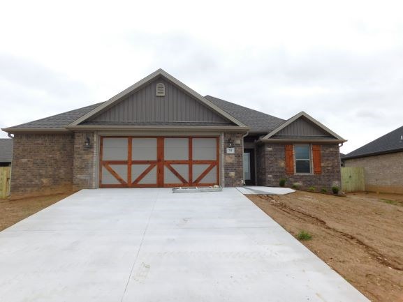 This brand new 1,612 sq. ft. home could be your perfect fit! So many features including 3 BR, 2 BA, 2 car garage w/bump out, LVL plank floors, carpet, 2" blinds, see-thru fireplace plus crown moulding. The kitchen boasts of custom cabinets, micro vent, dishwasher, granite countertops and a pantry. The bathrooms have tile shower walls w/fiberglass pan, semi-frameless shower doors in master tile shower, barn door in MA BR. Wood wrapped windows, cedar shutters and gutters add to the beauty of this home. Fenced backyard, full sod, landscaping, too! Seller to pay up to $3200 of buyers closing cost & prepaids.